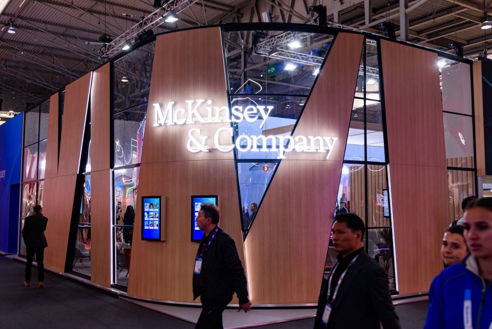 A McKinsey & Company logo inside an office building.