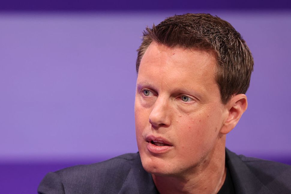 Paramount Skydance CEO David Ellison against a purple background.